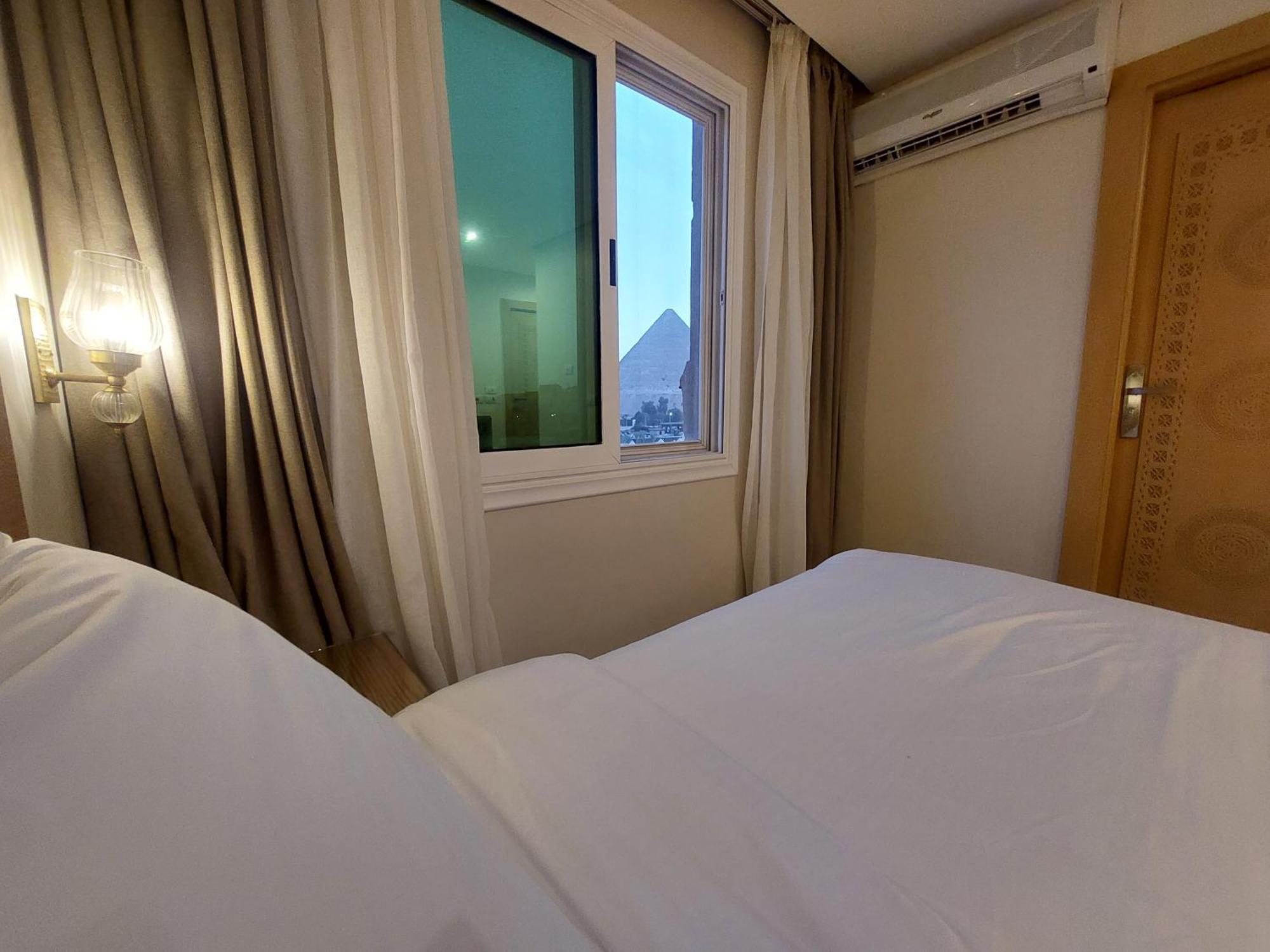 Doudou Pyramids View Hotel Kafret el-Gabal Exterior foto