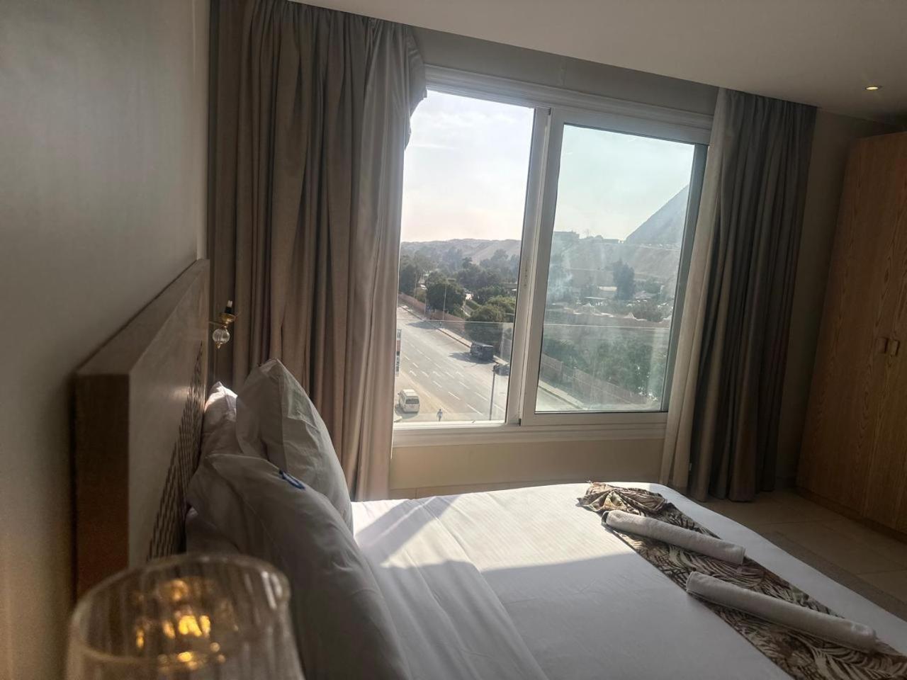 Doudou Pyramids View Hotel Kafret el-Gabal Exterior foto