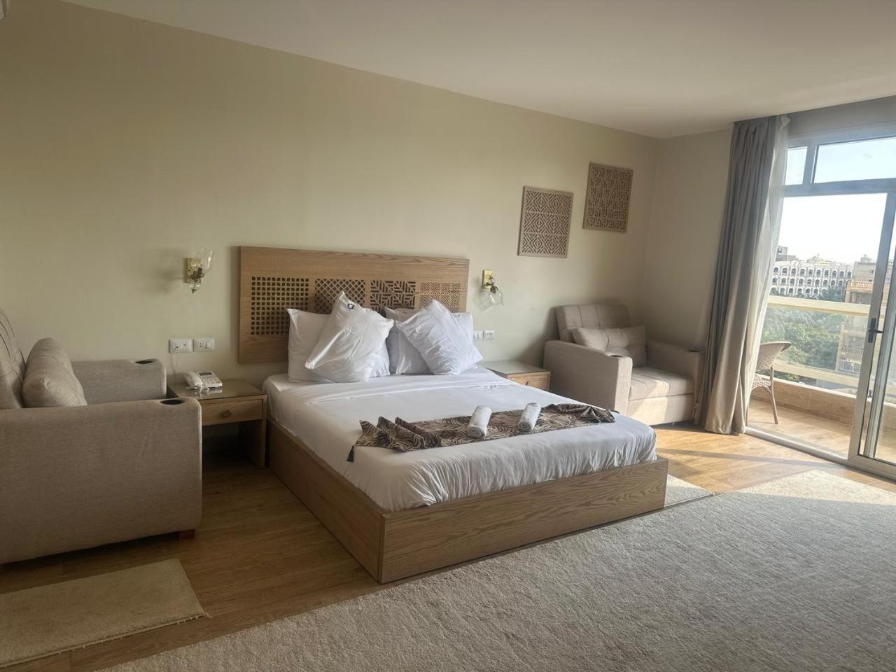 Doudou Pyramids View Hotel Kafret el-Gabal Exterior foto
