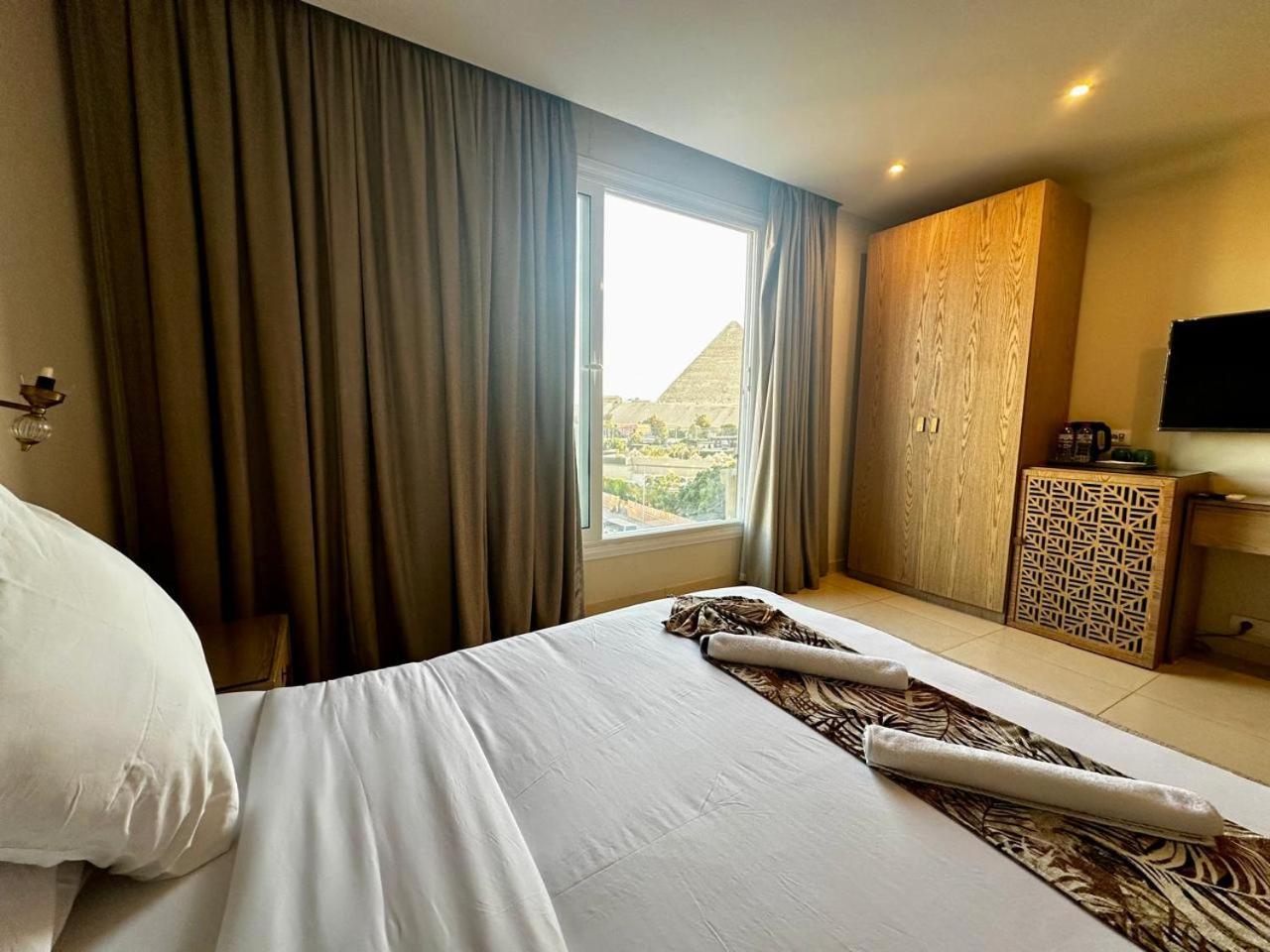 Doudou Pyramids View Hotel Kafret el-Gabal Exterior foto